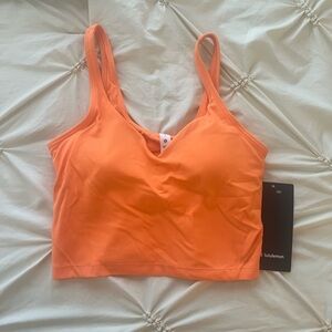 Lululemon brand new align tank never worn. Selling because it’s too small.